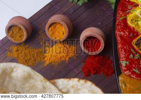 Indian Colourful Spices Also Know As Red Chilli Powder, Turmeric Powder, Coriander Powder, Mirchi, M
