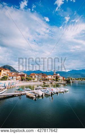 Feriolo, Verbania / Italy - June 2021: Feriolo Village On Lake Maggiore With Cloudy Sky With Small B