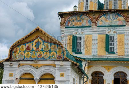 Frescoes On The Pediment. The Ancient Cathedral Of The Resurrection Of Christ Close Up On A Sunny Ju