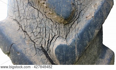 Old Tractor Or Heavy Agricultural Machinery Tire, Close Up Texture. Wheel Worked In Farm. Transporta