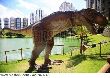 Dinosaur Sculpture In Park