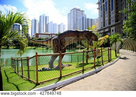 Dinosaur Sculpture In Park
