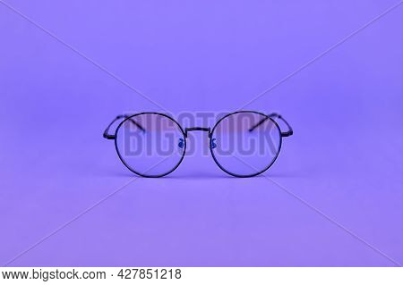 Glasses With A Blue Light Filter To Protect The Eyes While Working At The Computer. Round Glasses Fo