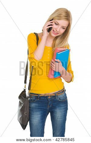 幸せな学生の女の子の携帯電話の話