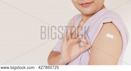Covid-19 Vaccination Campaign, Coronavirus Vaccinated Immunity Concept. Asian Woman Getting Vaccine 