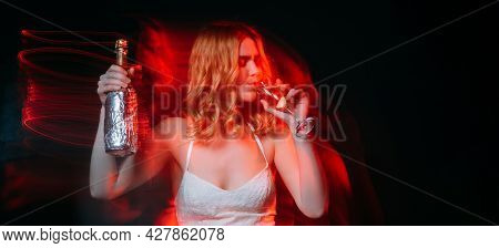 Bridal Party. Drunk Woman. Festive Celebration. Holiday Fun. Pretty Lady Drinking Champagne Holding 