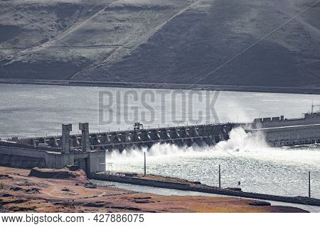 Large Hydro Dam Turning Flow Of Columbia River Into Renewable Electric Power Energy, John Day Dam, O