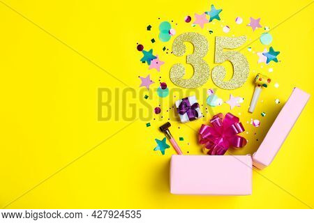 Flat Lay Composition With Decor And Numbers On Yellow Background, Space For Text. 35th Birthday Part