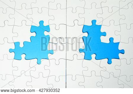Puzzle Pieces Frame With Nlue And White Background