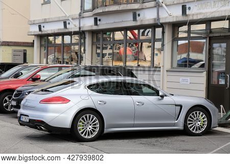 Haugesund, Norway - July 22, 2020: Porsche Panamera Hybrid Full Size Luxury Car Parked In Norway. Th