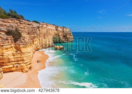 The famous beach of Praia dos Caneiros. Algarve.Portugal
