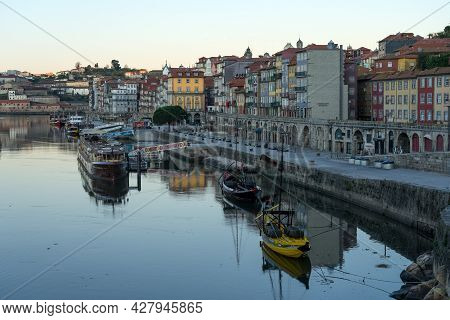Porto, Portugal - December 02, 2019: A Ribeira Zone At Sunrise In The Old Town Of Porto With The His