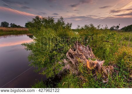 Sunset Over Warta River In Warta Landscape Park, Lad, Poland.