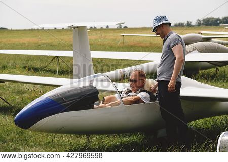 Soaring Club, Getting Ready For The Flight On Glider Airplane. Small Aviation Sport. Two Man Checkin