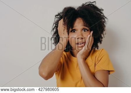 Oh No, I Did Not Prepared. Shocked And Nervous Cute Dark Skinned Female Student In Yellow Tshirt, Ho