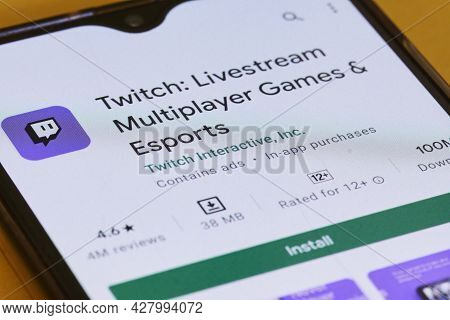 Tashkent, Uzbekistan - July 6, 2021: Searching And Downloading Twitch App To Smartphone. Popular Vid
