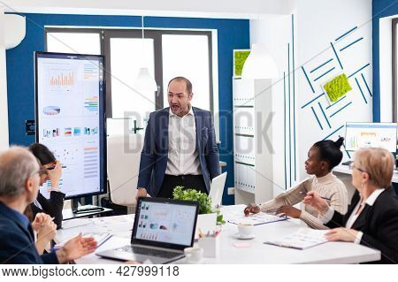 Mad Nervous Manager In Briefing Conferecen Room Screaming Et Multiethnic Diverse Employee Asking For