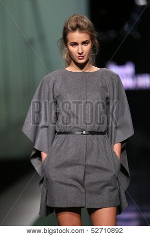 ZAGREB, CROATIA - OCTOBER 19: Fashion model wearing clothes designed by Pavla Aleksic on the 'Fashion.hr' show on October 19, 2013 in Zagreb, Croatia.