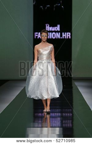 ZAGREB, CROATIA - OCTOBER 19: Fashion model wearing clothes designed by Branka Donassy on the 'Fashion.hr' show on October 19, 2013 in Zagreb, Croatia.