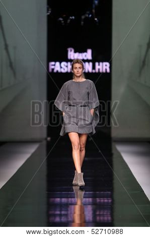 ZAGREB, CROATIA - OCTOBER 19: Fashion model wearing clothes designed by Pavla Aleksic on the 'Fashion.hr' show on October 19, 2013 in Zagreb, Croatia.