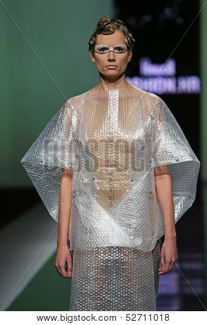 ZAGREB, CROATIA - OCTOBER 19: Fashion model wearing clothes designed by Branka Donassy on the 'Fashion.hr' show on October 19, 2013 in Zagreb, Croatia.