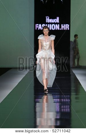 ZAGREB, CROATIA - OCTOBER 19: Fashion model wearing clothes designed by Branka Donassy on the 'Fashion.hr' show on October 19, 2013 in Zagreb, Croatia.
