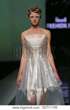 ZAGREB, CROATIA - OCTOBER 19: Fashion model wearing clothes designed by Branka Donassy on the 'Fashion.hr' show on October 19, 2013 in Zagreb, Croatia.