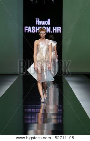 ZAGREB, CROATIA - OCTOBER 19: Fashion model wearing clothes designed by Branka Donassy on the 'Fashion.hr' show on October 19, 2013 in Zagreb, Croatia.