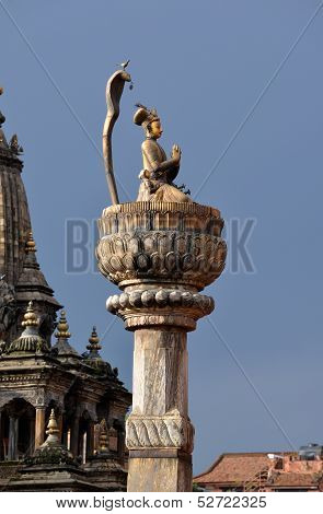 King Yoganarendra Malla bronze statue, under cobra snake. Patan, Nepal