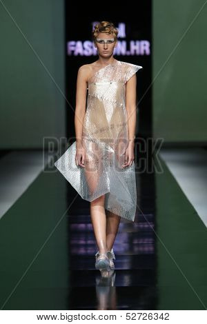 ZAGREB, CROATIA - OCTOBER 19: Fashion model wearing clothes designed by Branka Donassy on the 'Fashion.hr' show on October 19, 2013 in Zagreb, Croatia.