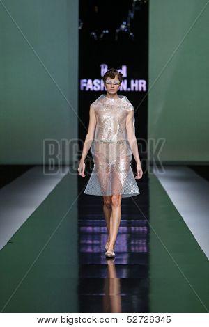 ZAGREB, CROATIA - OCTOBER 19: Fashion model wearing clothes designed by Branka Donassy on the 'Fashion.hr' show on October 19, 2013 in Zagreb, Croatia.