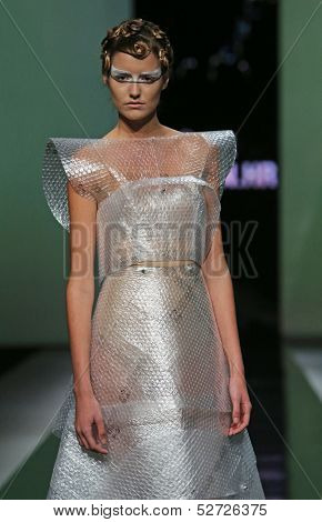 ZAGREB, CROATIA - OCTOBER 19: Fashion model wearing clothes designed by Branka Donassy on the 'Fashion.hr' show on October 19, 2013 in Zagreb, Croatia.