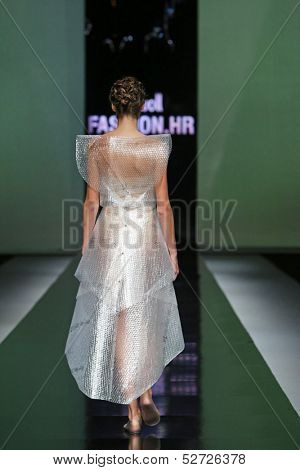 ZAGREB, CROATIA - OCTOBER 19: Fashion model wearing clothes designed by Branka Donassy on the 'Fashion.hr' show on October 19, 2013 in Zagreb, Croatia.