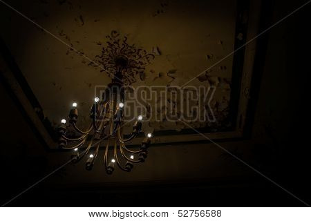 Chandelier In Dark Grungy Concrete Room