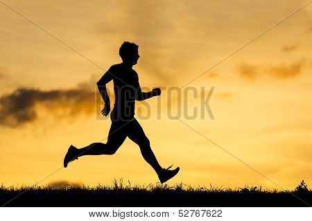 silhouette of a runner