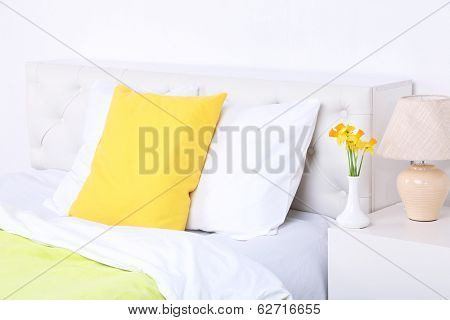 Comfortable soft bed with pillows