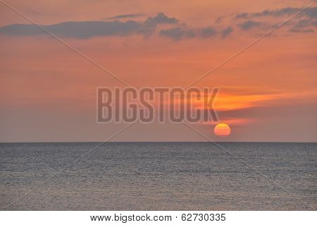 An orange Sun setting in Cuba