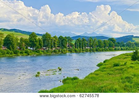 Spring Landscape With The Tatra Mountains Over The Dunajec River.