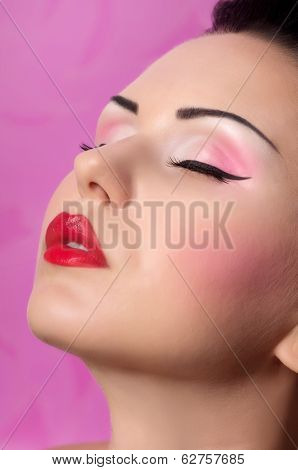 Portrait of beautiful young woman with makeup