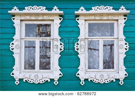 Wooden Platbands On Two Window Of An Village House