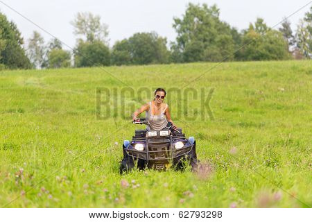 Elegant Woman Riding Extreme Quadrocycle