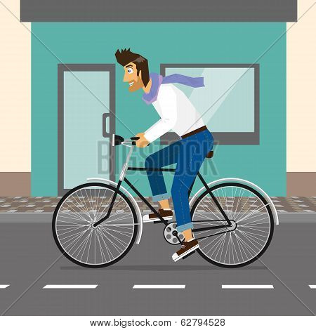 Handsome guy rides a bike
