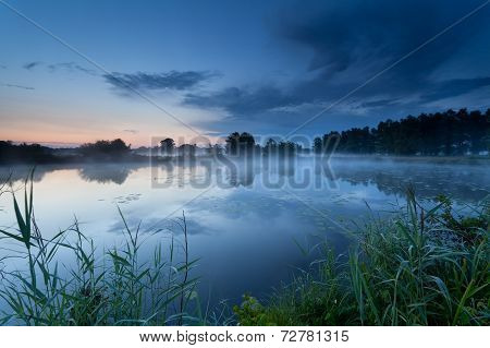 Misty Sunrise On River In Summer