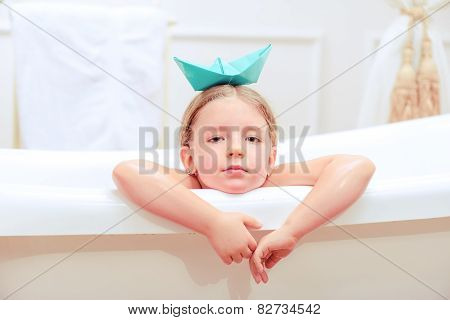 Cute little girl in the bathroom
