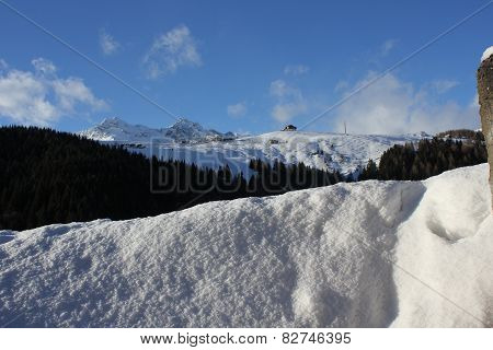 Mountain covered with snow in a sunny day