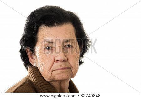 portrait of grandmother looking nostalgic at camera