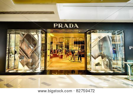 SHENZHEN, CHINA - FEBRUARY 04, 2015: Prada boutique. Prada is an Italian luxury fashion house, specializing in ready-to-wear leather and fashion accessories, shoes, luggage, perfumes, watches, etc.,