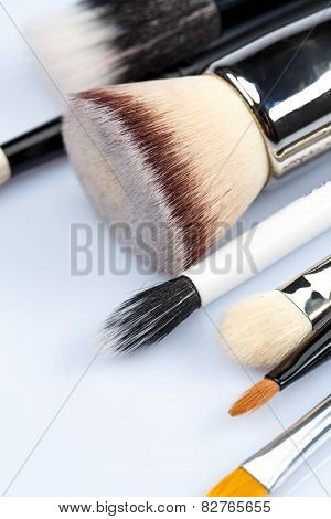 Makeup brushes on white background