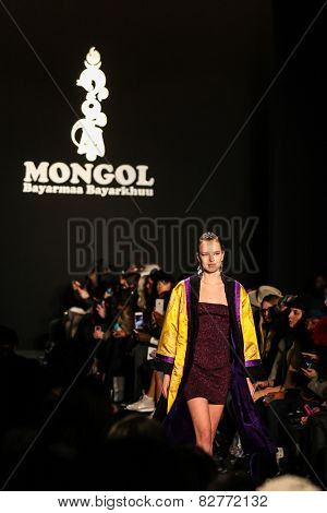 NEW YORK - FEBRUARY 13: A model walks the runway at the Mongol Fall/Winter 2015 collection during Mercedes-Benz Fashion Week in New York on February 13, 2015.