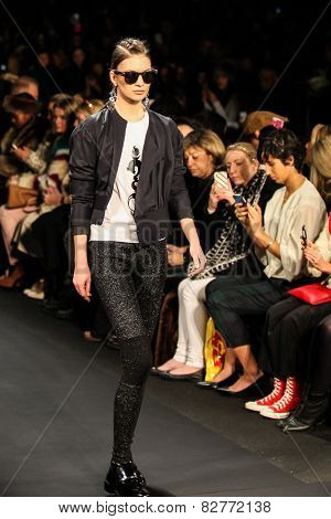 NEW YORK - FEBRUARY 13: A model walks the runway at the Mongol Fall/Winter 2015 collection during Mercedes-Benz Fashion Week in New York on February 13, 2015.
